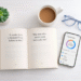10 Hacks to Read More Books in 2026 A top-down flat-lay of an open book featuring a George R.R. Martin quote about reading, next to a smartphone showing a digital wellbeing app on a clean white desk.